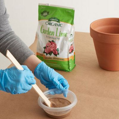 age a terra cotta pot mix garden lime and water