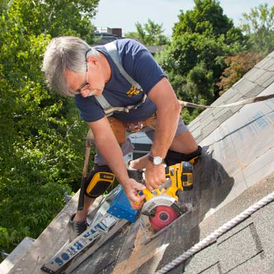 install watertight skylight using a circular saw to cut hole in roof for skylight