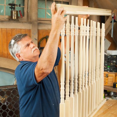 Tom Silva attaches the top rail