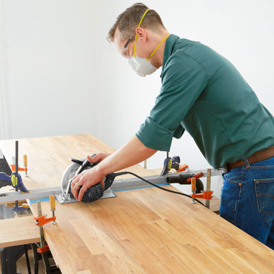 cutting the butcher-block with a circular saw