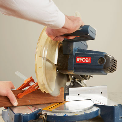 setting up a stop block to cut identical pieces with a miter saw