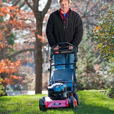 roger cook showing how to mow low to prepare your lawn for winter