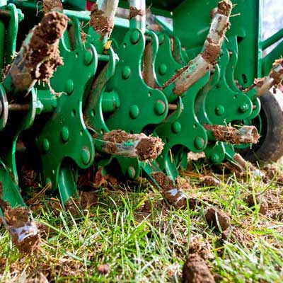 roger cook showing how to Aerate and prepare your lawn for winter