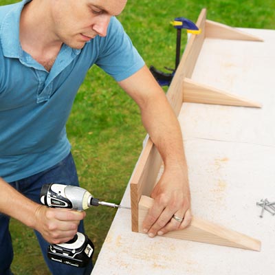 Attach the Backrest Brackets to build a compost bench