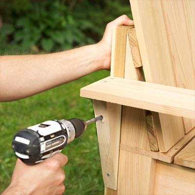 Attach the Armrests to build a compost bench