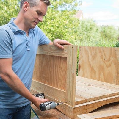 attaching the panels with a drill/driver