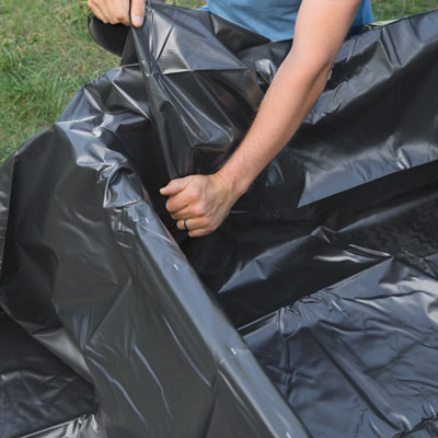 laying out the pond liner