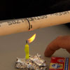 lit birthday candle heats up piece of PVC