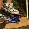 foot operated bicycle pump with pressure gauge attached