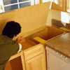 Attach the countertop to the cabinet