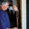 remove old sash weights and insulte behind the window frame