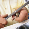 file away the pitted wall of the faucet washer