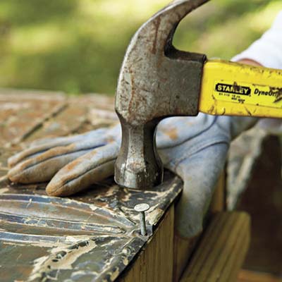 Fasten the metal to the planter box
