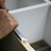 scooping out wood with chisel