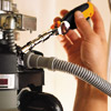a hose clamp over the drain line
