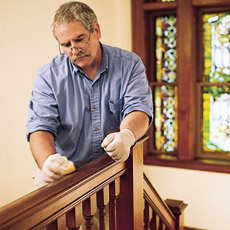 man waxing the wood