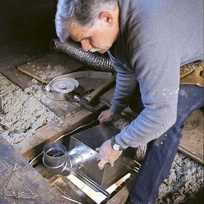 Setting the fan down between the joists