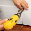Attaching the door aligner.