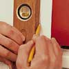 install the lower hinge pintles for exterior shutters