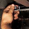 Clamping the door to the lintel.