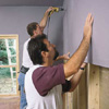 covering the wall with drywall 