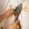 A straight edge and a sharp blade ensure clean cuts.