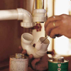 connecting the drain of the sink
