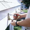 attaching fascia brackets for a gutter installation
