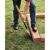 Marking the bed's outline with a shovel, using laid out timbers as a stencil.