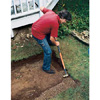 Digging trenches for bed walls, using a spade.