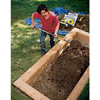 Filling the bed with soil.