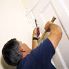 removing the old door when installing a new one