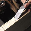 chiseling out for the hinges of a new door