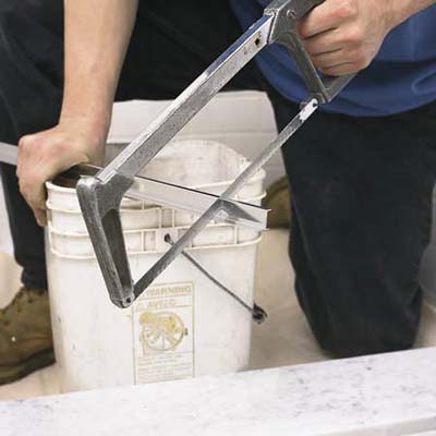 Setting the base track of a shower door