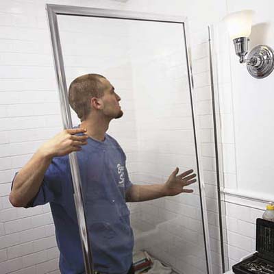 installing the remaining side jamb of a shower door