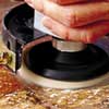 polishing the clean surface with a polishing tool and marble polishing powder