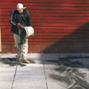 spreading stone dust over a patio