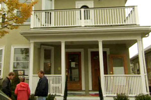 Roger Cook in front of the East Boston house project