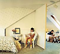 Install a wall to create an extra bedroom.