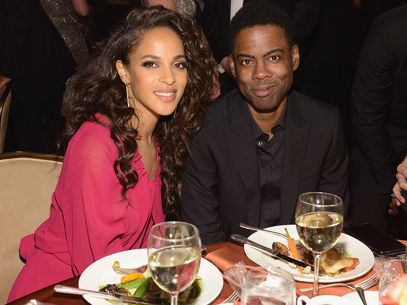 Megalyn Echikunwoke and Chris Rock at the Clive Davis 40th annual pre-Grammy Awards